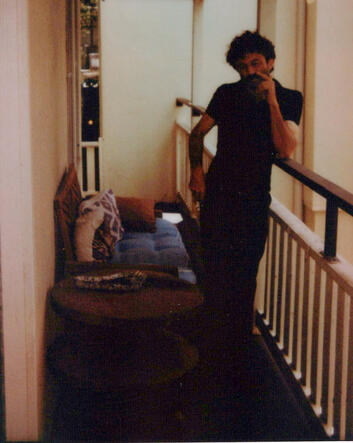 Hogan Ellis standing in a narrow corridor during the Kingdom of Forgetting photo session